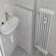 Kouelna - umyvadlo a radiator.jpg